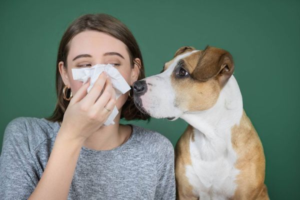 woman with dog allergy